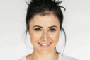 woman-in-white-crew-neck-shirt-smiling.jpg woman in white crew neck shirt smiling